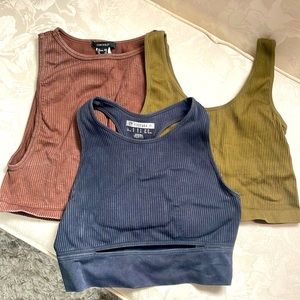 Forever 21 cropped tank tops. Colors: Chocolate, charcoal, and army green.